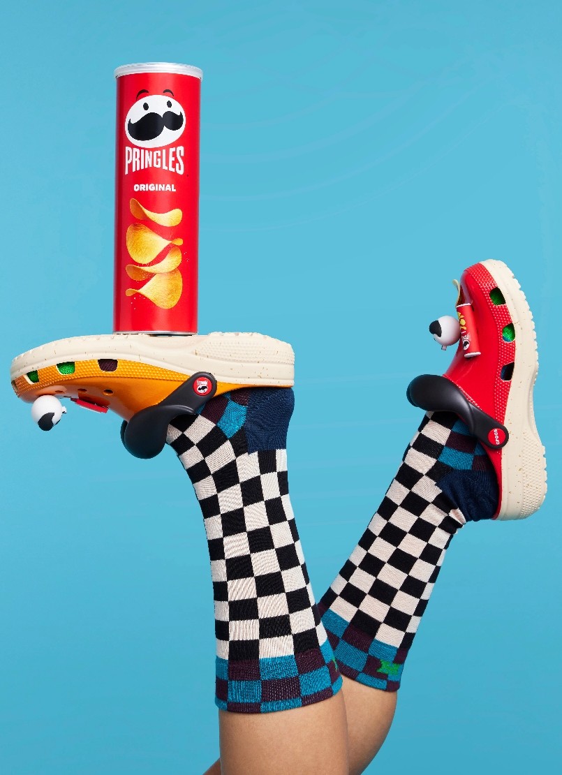 checkered socks with pringles branded crocs shoes