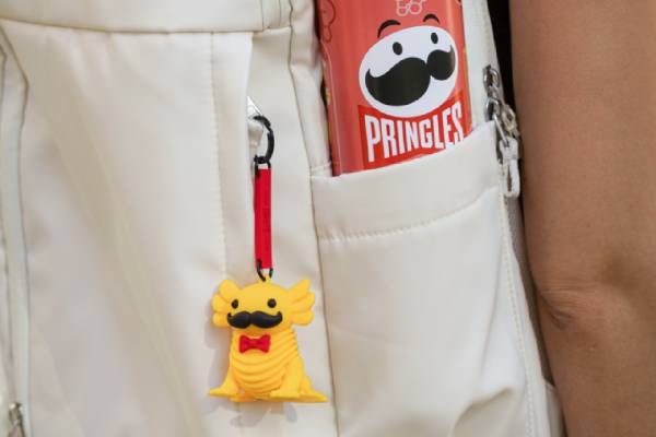 pringamabob character snaxolotl keychain on a backpack